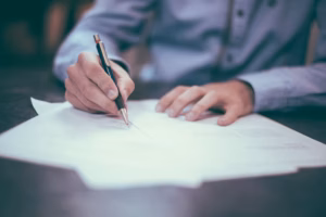 Business owner reviewing LLC insurance documents at a desk