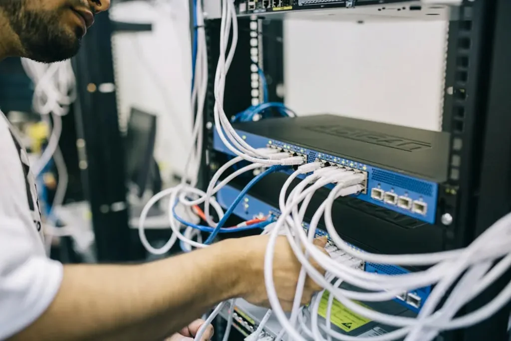 IT professional configuring server networks to support enterprise endpoint security solutions.