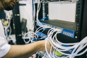 IT professional configuring server networks to support enterprise endpoint security solutions.