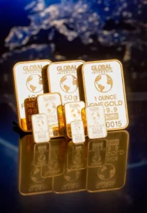 Gold investment bars of various weights (1g to 1 ounce) branded by Global InterGold, displayed on a reflective surface against a dark world map background, illustrating gold as a financial asset.