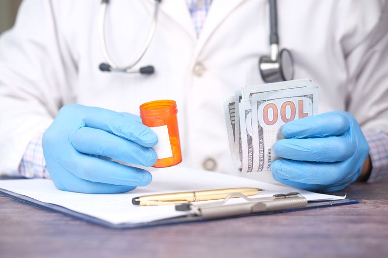 "A doctor holding a prescription pill bottle and a stack of hundred-dollar bills, symbolizing the IRMAA Medicare surcharges and high healthcare costs."